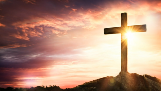 image of cross with sunlight