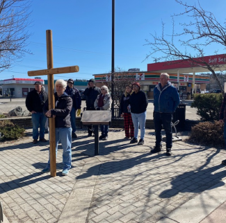 Prayer on corner downtown Vanderhoof